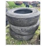 Stack of 255:80R22.5 tires (3)