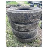 Stack of 295/75R22.5 tires (4)