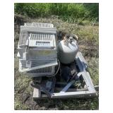 Pallet with air conditioner, hitch, propane tank,