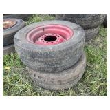 Stack of P215/60R14 tires on rims