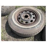 P205/75R15 tire on rim