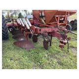 International 4 bottom plow with auto reset