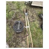 Plow, cream can and post hole digger