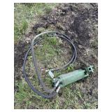 Hydraulic cylinder and hose