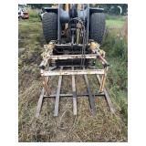 Grapple bucket for a skidloader