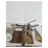 Saw, Tool and die set, etc