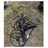 Hitch, hose and steering wheel