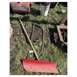 Saw and shovel