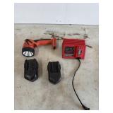 Milwaukee spotlight with 2 batteries and a