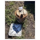 Oil can and sign