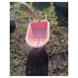 Wheel barrow and broom