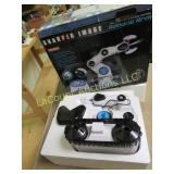 Sharper Image robotic arm in box