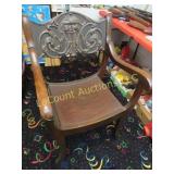 Antique curved seat chair applied face back