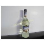 Sealed bottle White Sambuca Liqueur