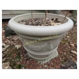 nice large planter filled with dirt