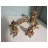 5 heavy metal brass or brass colored dog figures