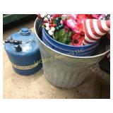 trash can kerosene can w contents flowers flag