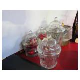 4 glass canisters and ice bucket