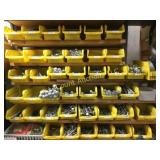 all yellow bins with many many assorted bolts