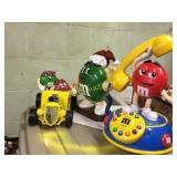 M & M dispensers one is a telephone