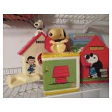 Snoopy jack in the box book rack w books snowcone