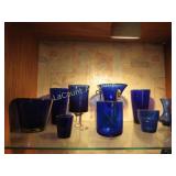 assorted blue glasssware vases beautiful