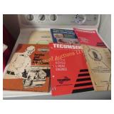 assorted repair books manuals