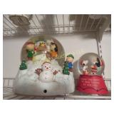 2 Snoopy snow globe one nice large one
