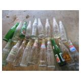 assorted vintage soda bottles