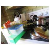 assorted pots pans misc tupperware measuring