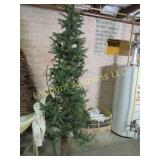 nice slim artificial Christmas tree wood stump