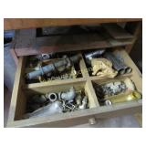 drawer of plumbing supplies