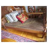antique day bed w pad and pillows