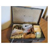 old suitcase full of antique buttons many many