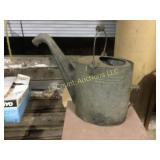 antique watering can