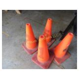 4 orange traffic cones
