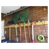 yard tools rakes shovels light sprinklers