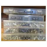 assorted springs clips wing nuts rubber grommets