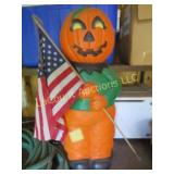 blwo mold pumpkin mad holding US flag