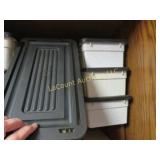4 empty storage plastic containers