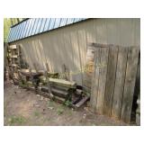 all wood on side of shed green treat posts more