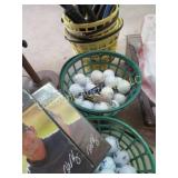 Large amount golf balls baskets Golf DVDS handles