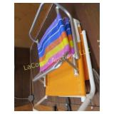 2 folding beach chairs