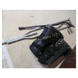 2 walking boots crutch & cane