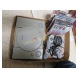 vintage Sony Playstation w controllers & games