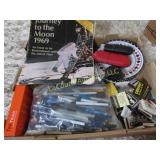 pens poker plates matches glasses moon brochure