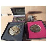 4 assorted belt buckles