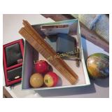 pool balls rulers globe bank wallet pocket knives