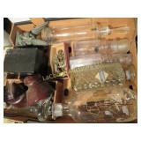 assorted bottles insulators keys gargoyle figure