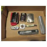 hand warmers pocket knifes tape measure